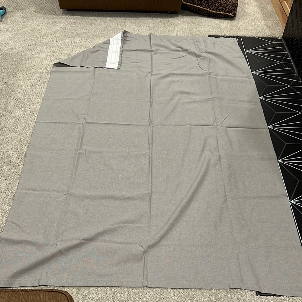 4 gray curtain panels.